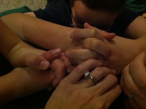 pic of family praying